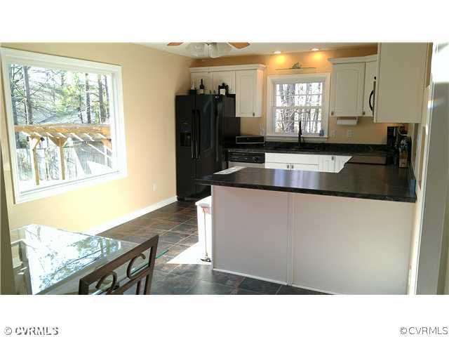 3114 Shiloh Church Road Midlothian, VA 23112 - Photo 16 of 24 a kitchen view living room and living room
