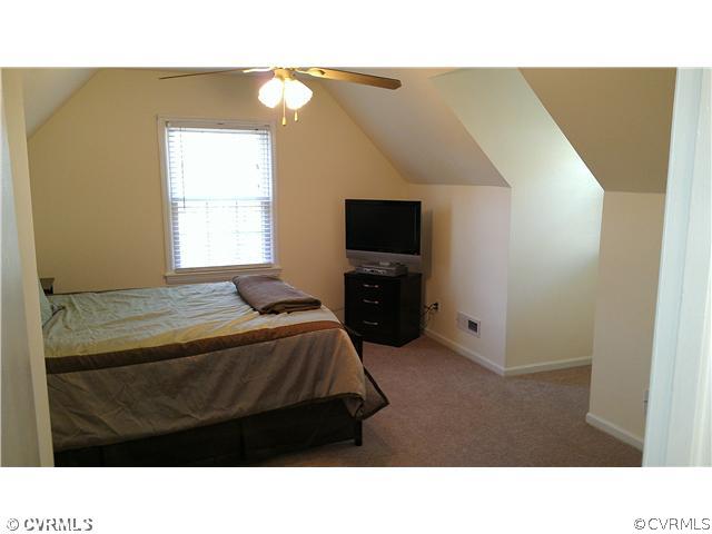 3114 Shiloh Church Road Midlothian, VA 23112 - Photo 20 of 24 a room with a bed tv and a window