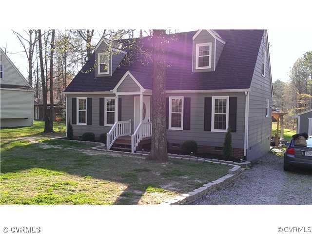 3114 Shiloh Church Road Midlothian, VA 23112 - Photo 2 of 24 a view of a house with a yard