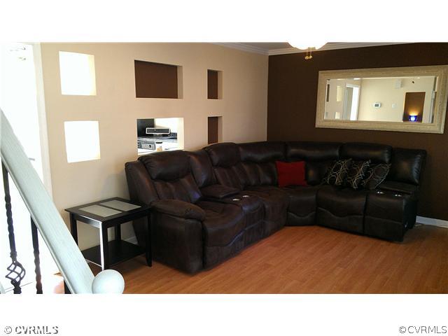3114 Shiloh Church Road Midlothian, VA 23112 - Photo 10 of 24 a living room with furniture and a flat screen tv