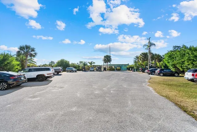 a group of cars parked in front of a building