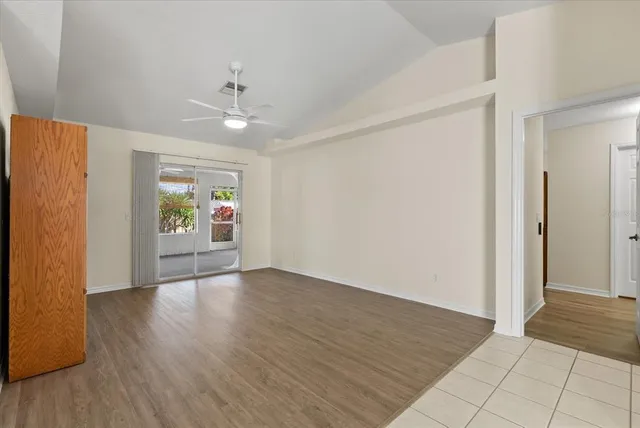 a kitchen with stainless steel appliances a sink and a refrigerator