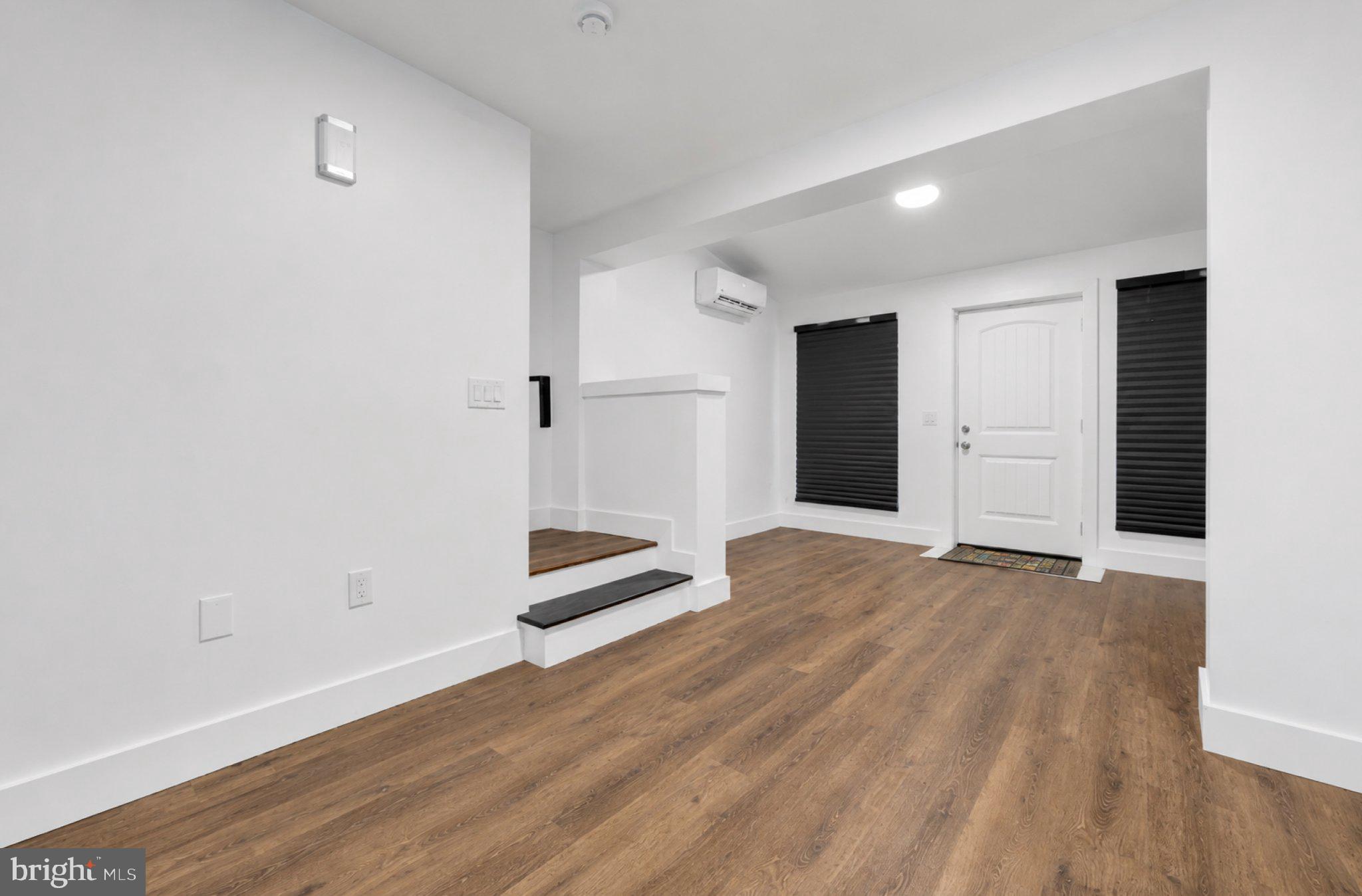 2801 Round Road Baltimore, MD 21225 - Photo 7 of 29 a view of empty room with wooden floor