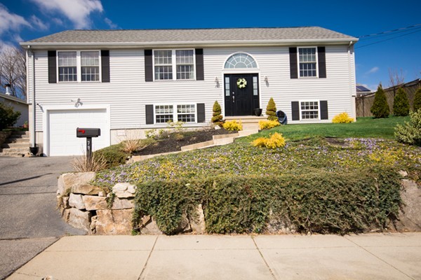 79 Huard Street Fall River, MA 02721 - Photo 1 of 30 a front view of a house with a yard