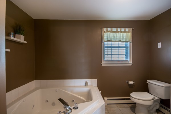 79 Huard Street Fall River, MA 02721 - Photo 14 of 30 a bathroom with a bathtub and sink