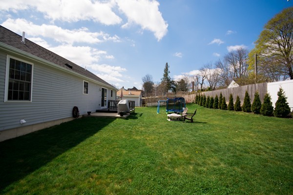 79 Huard Street Fall River, MA 02721 - Photo 29 of 30 a view of a backyard with sitting area