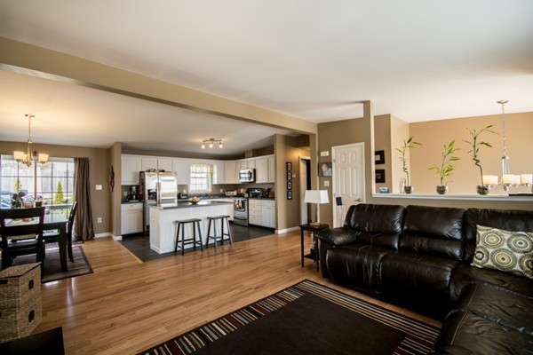 79 Huard Street Fall River, MA 02721 - Photo 3 of 30 a living room with stainless steel appliances kitchen island granite countertop furniture and a large window