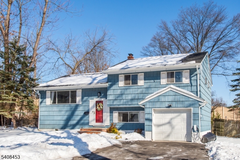 176 Harrison Road Parsippany, NJ 07054 - Photo 2 of 25 a front view of a house with a yard