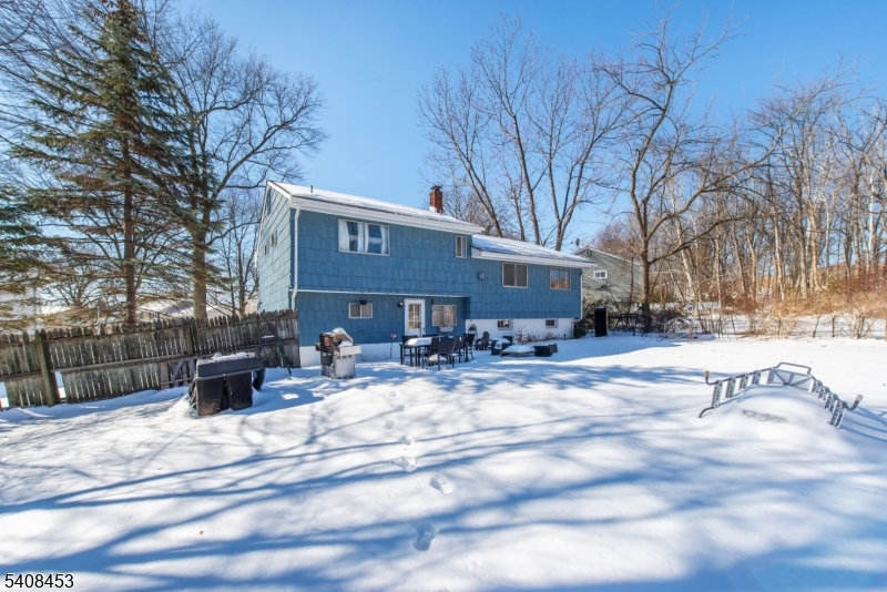 176 Harrison Road Parsippany, NJ 07054 - Photo 24 of 25 a view of a house with a yard
