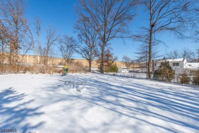 176 Harrison Road Parsippany, NJ 07054 - Photo 25 of 25 a view of road with covered with snow