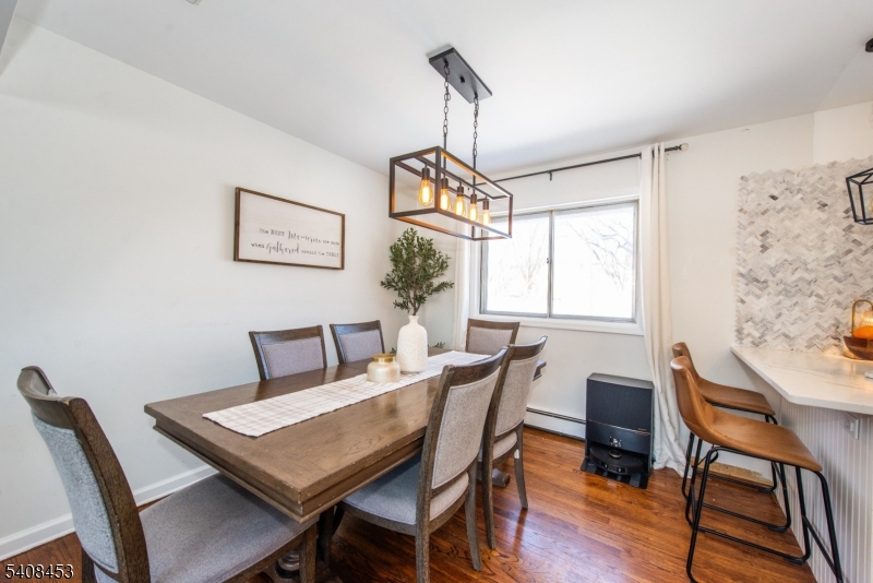 176 Harrison Road Parsippany, NJ 07054 - Photo 10 of 25 a view of a dining room with furniture window and wooden floor