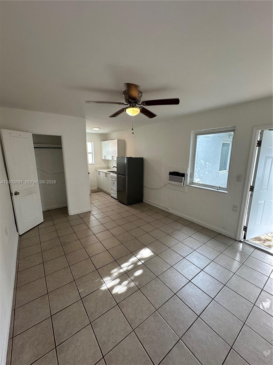 480 Southwest 10th Street, Unit 6 Miami, FL 33130 - Photo 1 of 7 a living room with furniture