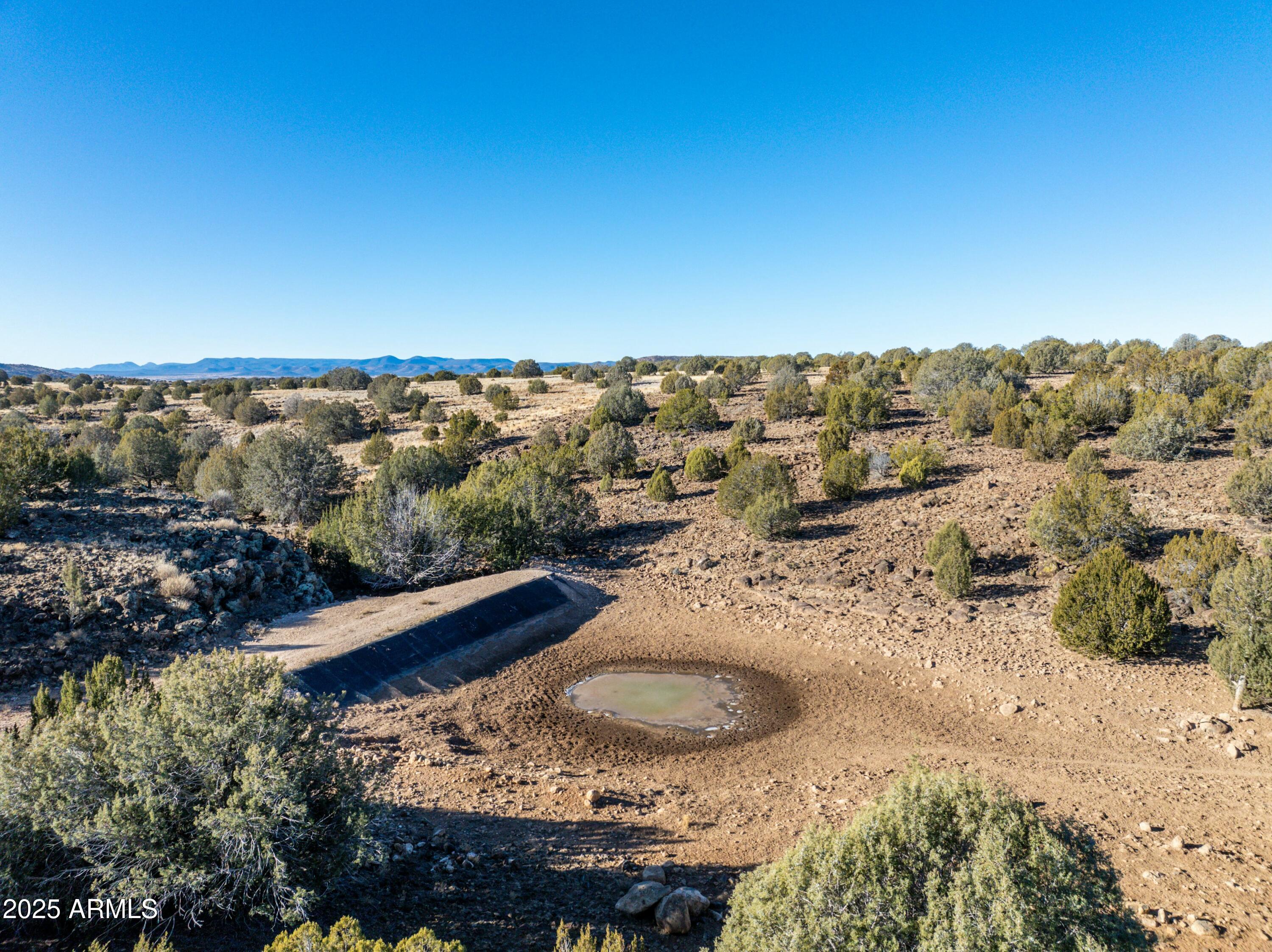10777 West Raging Crab Road Ash Fork, AZ 86320 - Photo 28 of 45 Seasonal pond