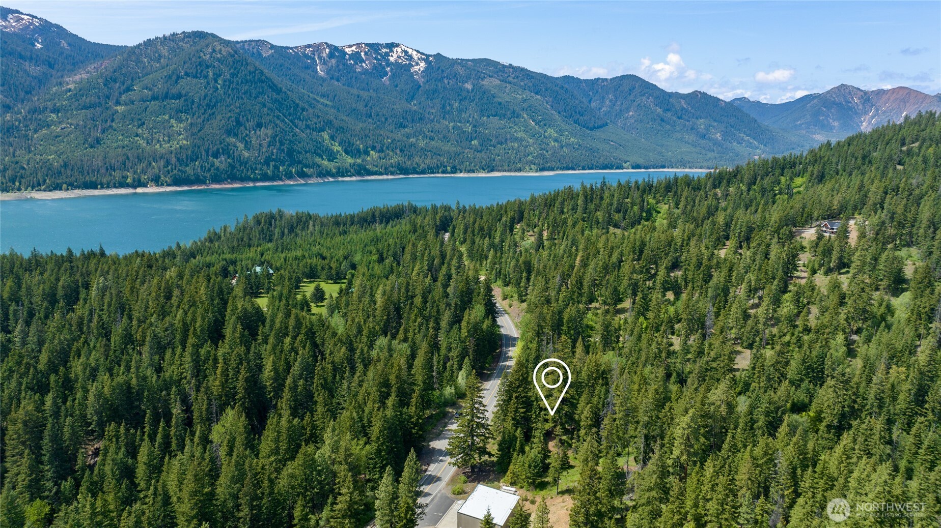 9 Salmon La Ronald, WA 98940 - Photo 4 of 9 a view of a lush green hillside and a building