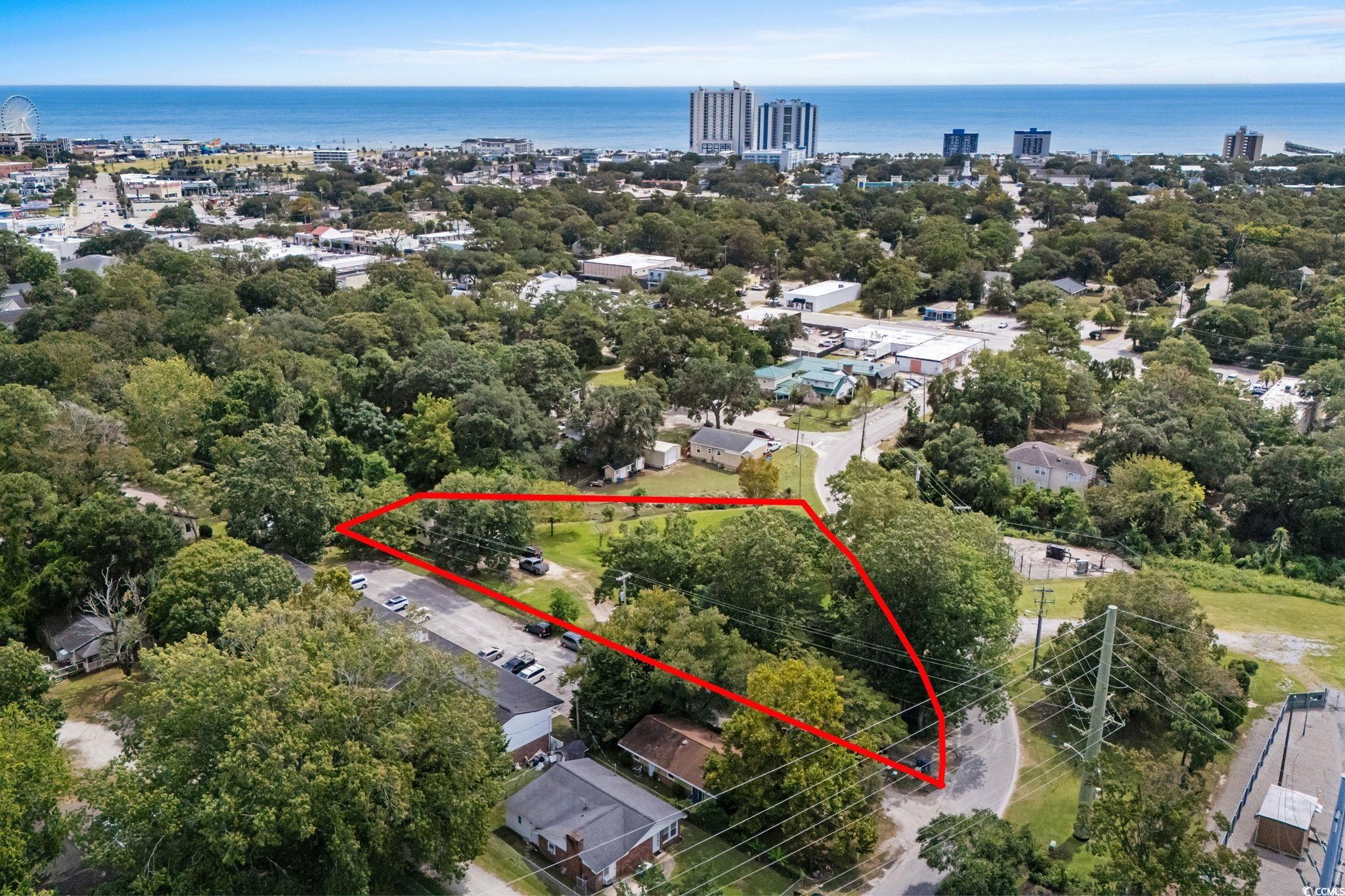 904 3rd Avenue North Myrtle Beach, SC 29577 - Photo 11 of 23 View of urban area with property parcel outlined and a nearby body of water