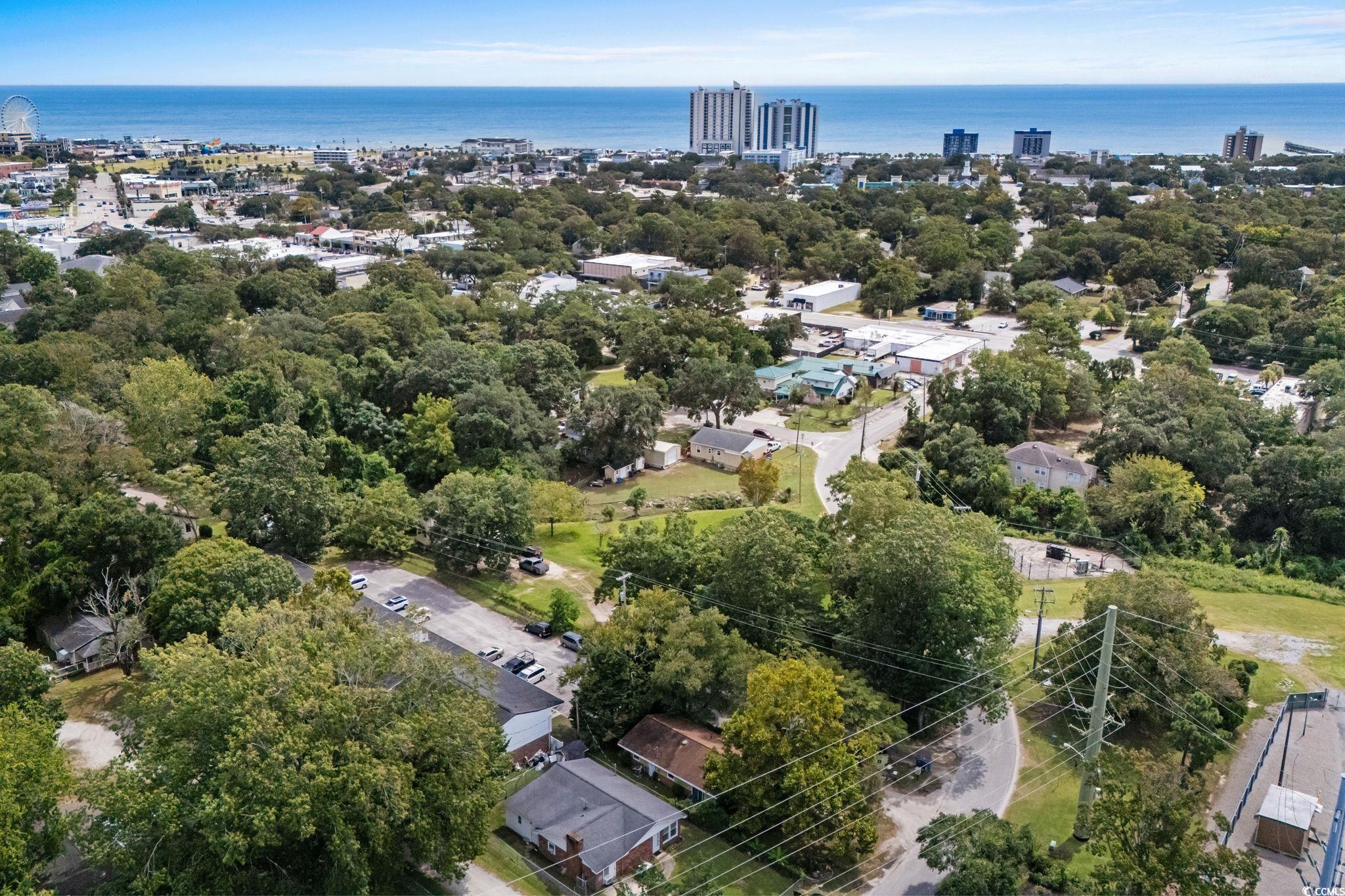 904 3rd Avenue North Myrtle Beach, SC 29577 - Photo 12 of 23 View of urban area featuring a large body of water and a tree filled landscape