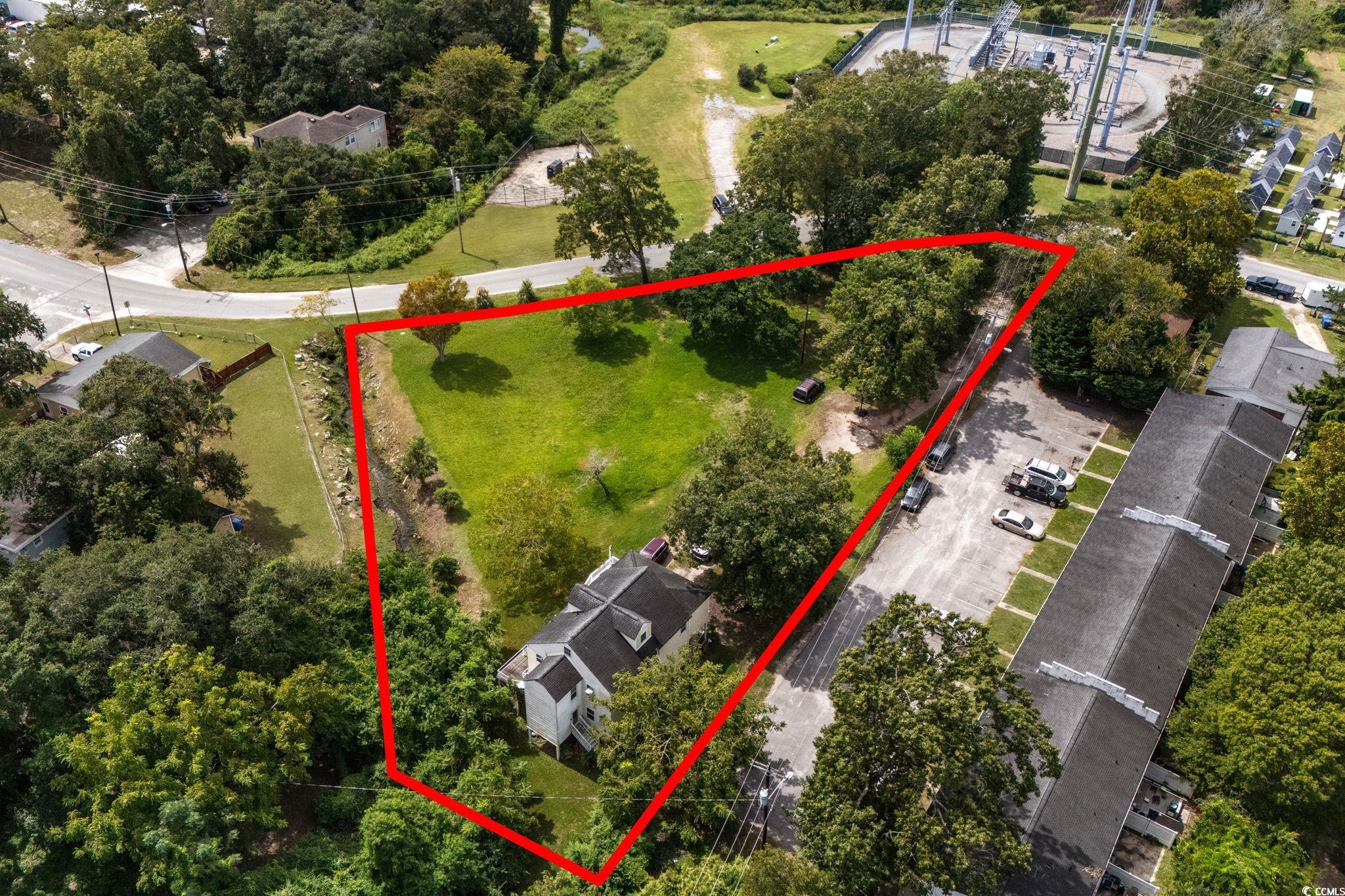 904 3rd Avenue North Myrtle Beach, SC 29577 - Photo 15 of 23 Aerial view of property and surrounding area featuring property boundaries highlighted