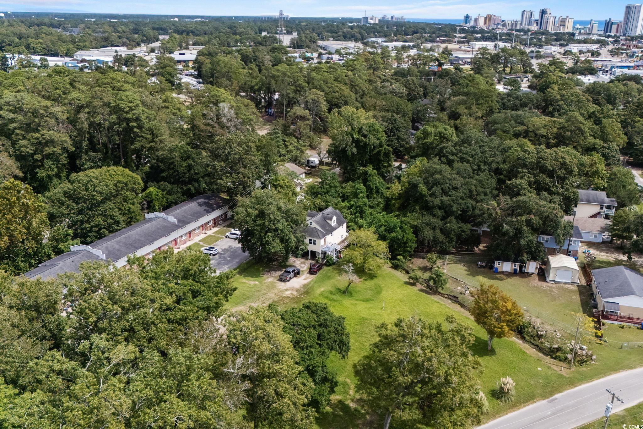 904 3rd Avenue North Myrtle Beach, SC 29577 - Photo 19 of 23 Aerial view of property and surrounding area with nearby urban area