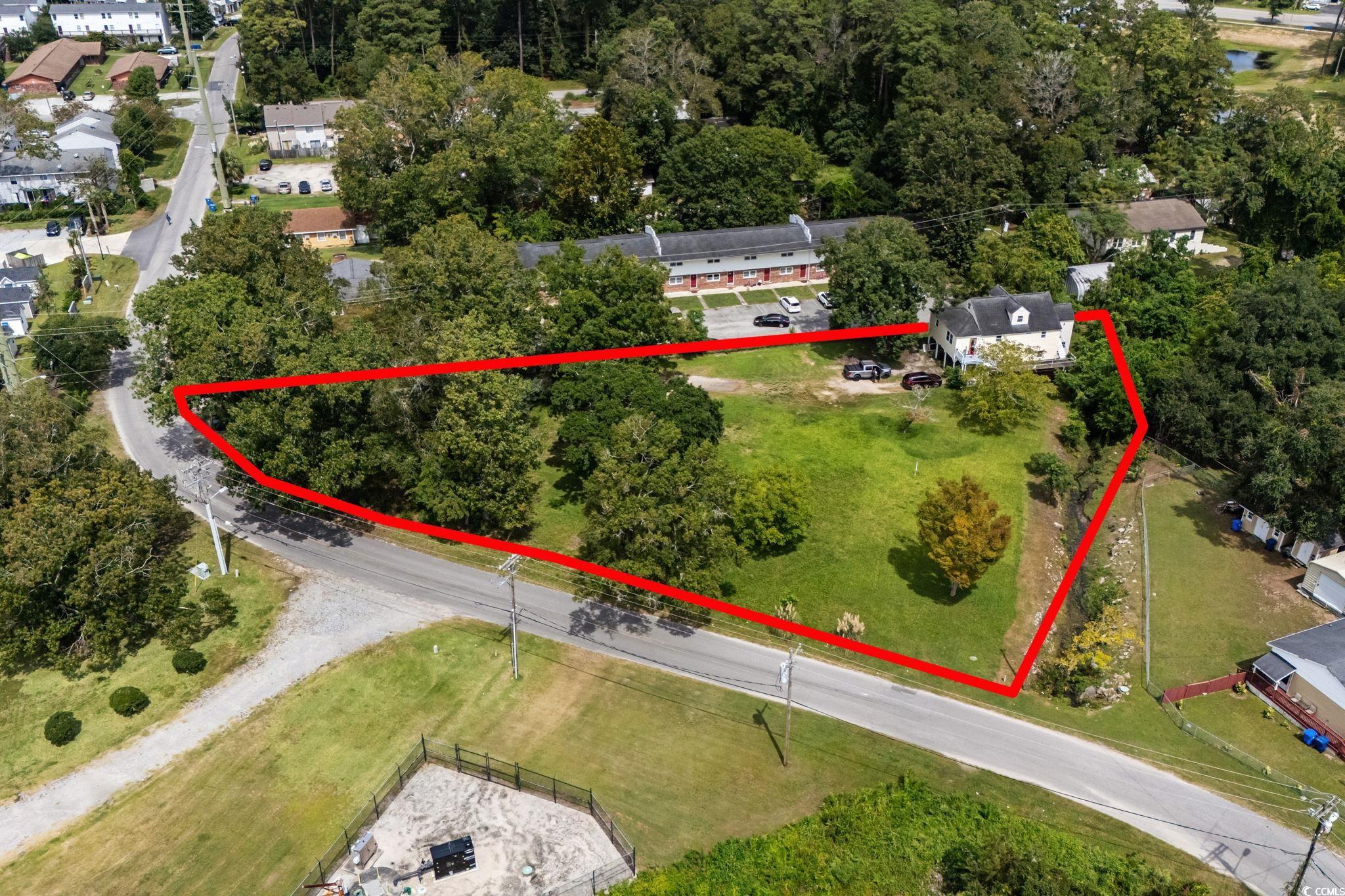 904 3rd Avenue North Myrtle Beach, SC 29577 - Photo 3 of 23 Aerial overview of property's location with property parcel outlined