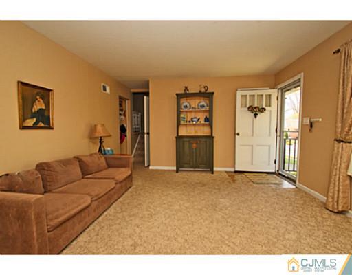 18 Dorian Road Metuchen, NJ 08840 - Photo 11 of 25 a living room with furniture and a area