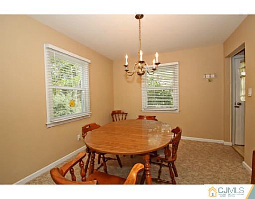 18 Dorian Road Metuchen, NJ 08840 - Photo 3 of 25 a view of a dining room with furniture and window