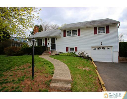 18 Dorian Road Metuchen, NJ 08840 - Photo 9 of 25 a view of a front of a house with a yard