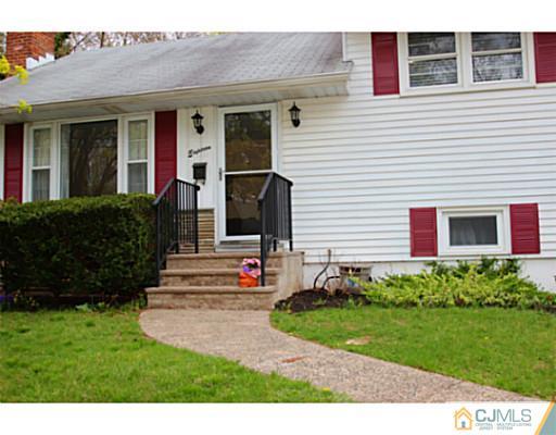 18 Dorian Road Metuchen, NJ 08840 - Photo 10 of 25 a front view of house with yard and green space
