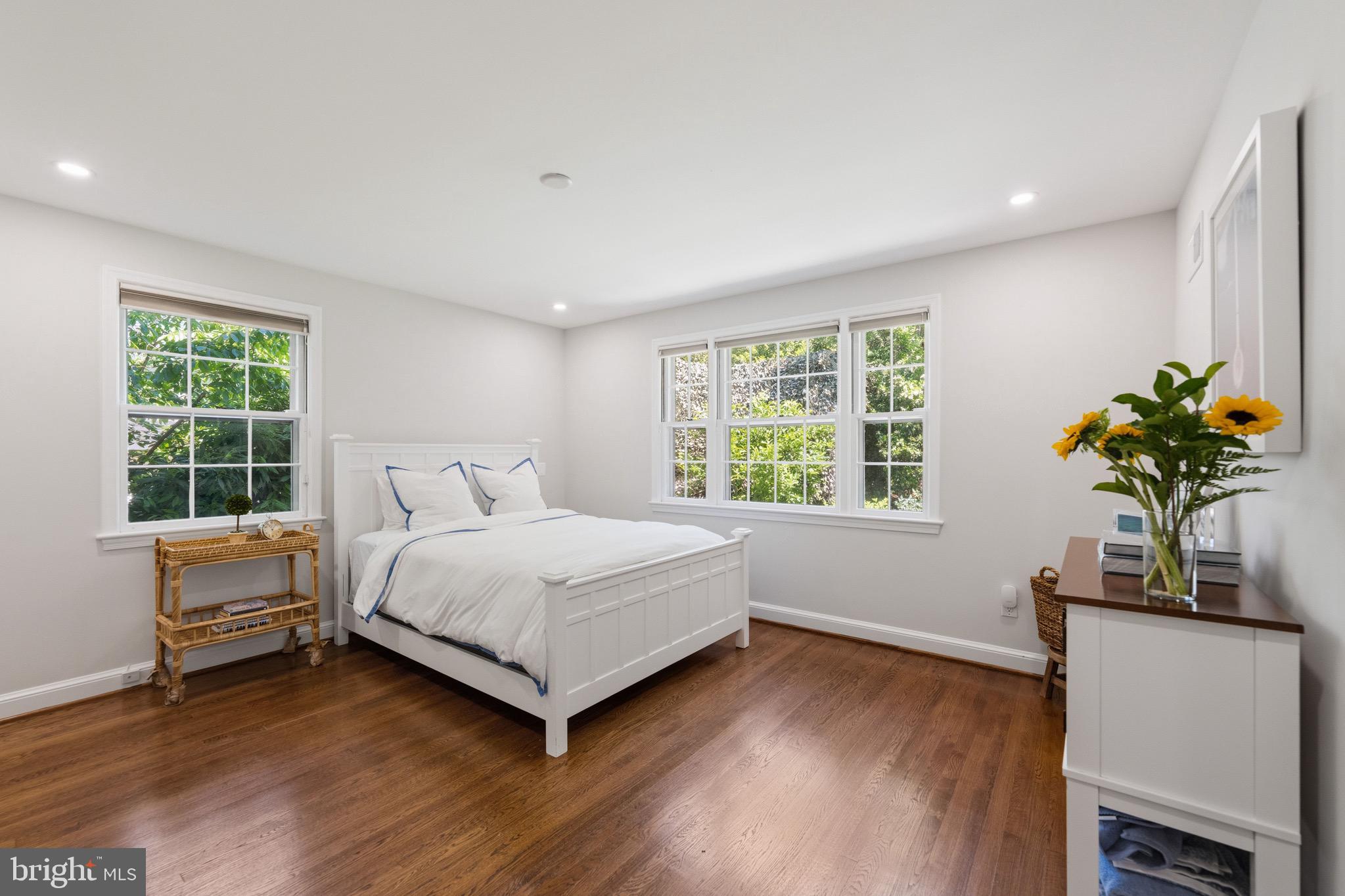 4555 W Street Northwest Washington, DC 20007 - Photo 23 of 34 a bedroom with a bed and a window