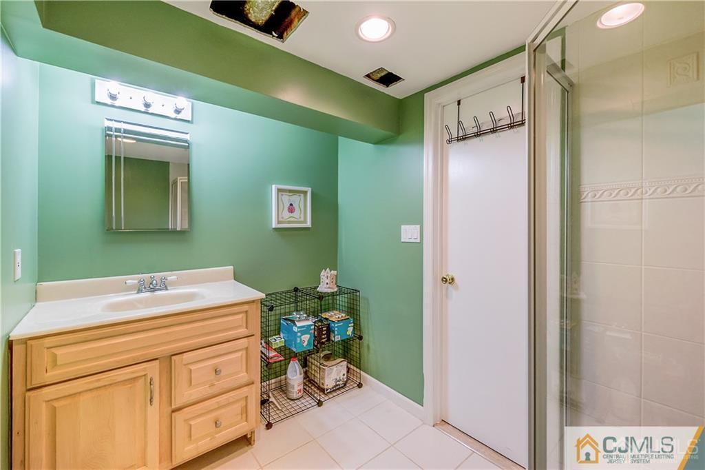 25 Timber Road East Brunswick, NJ 08816 - Photo 20 of 22 a utility room with dryer and washer