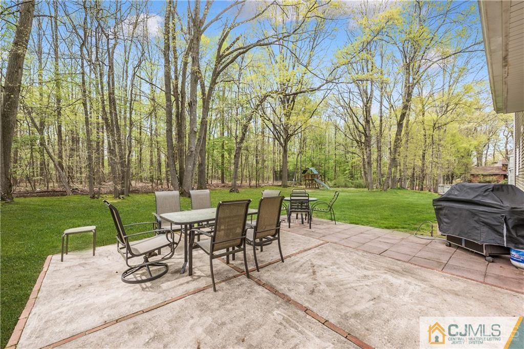 25 Timber Road East Brunswick, NJ 08816 - Photo 21 of 22 a view of a sitting area with furniture and garden