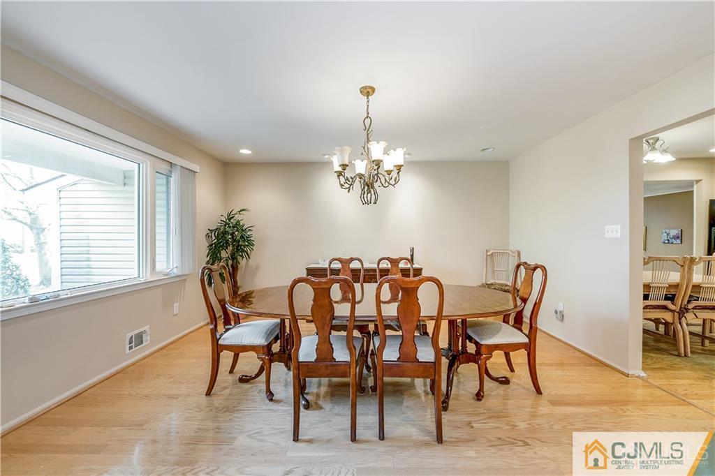 25 Timber Road East Brunswick, NJ 08816 - Photo 4 of 22 a dining room with furniture and window