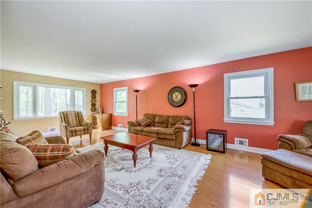 25 Timber Road East Brunswick, NJ 08816 - Photo 5 of 22 a living room with furniture and a window