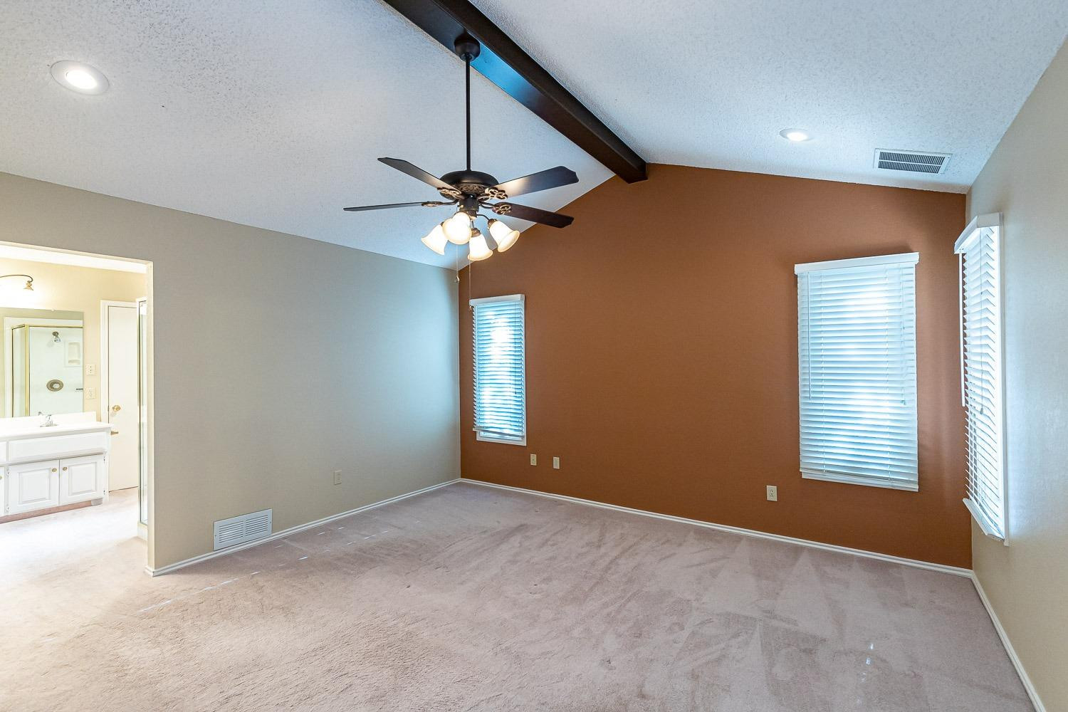 3202 66th Street, Unit A Lubbock, TX 79413 - Photo 17 of 37 Master Suite