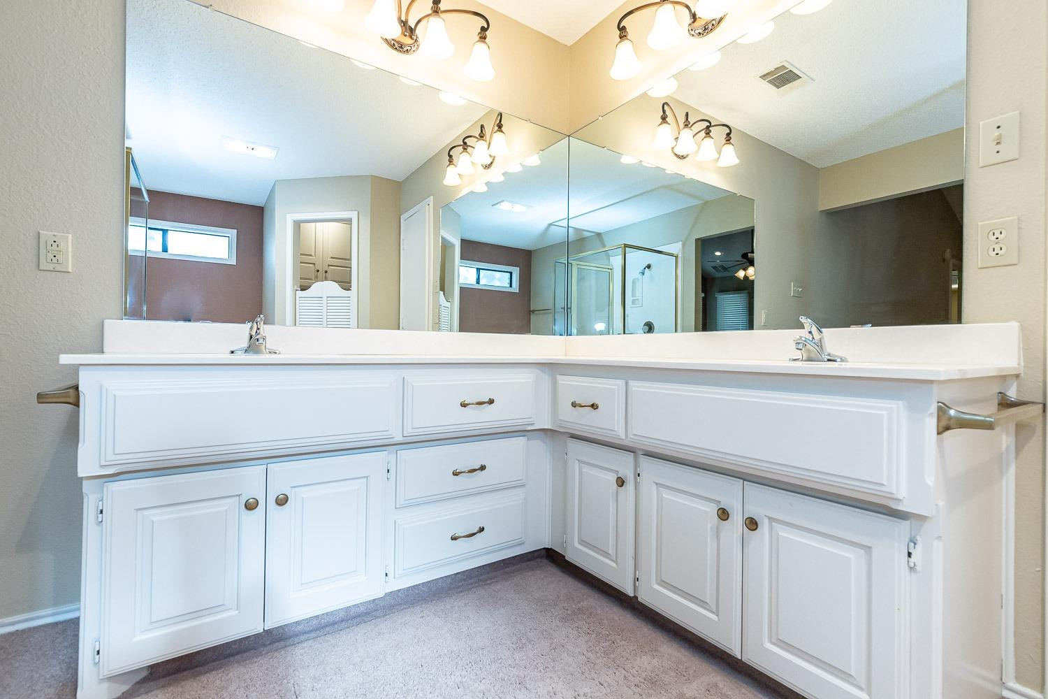 3202 66th Street, Unit A Lubbock, TX 79413 - Photo 19 of 37 Master Bath with Double Vanities