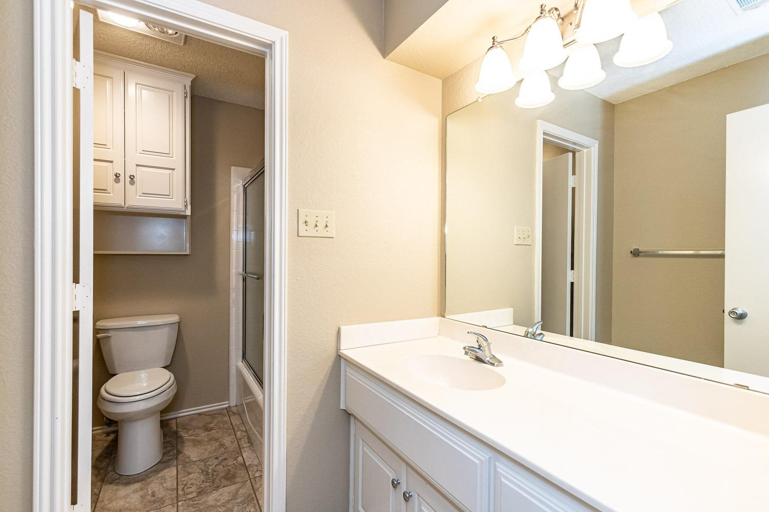 3202 66th Street, Unit A Lubbock, TX 79413 - Photo 26 of 37 Second Bath