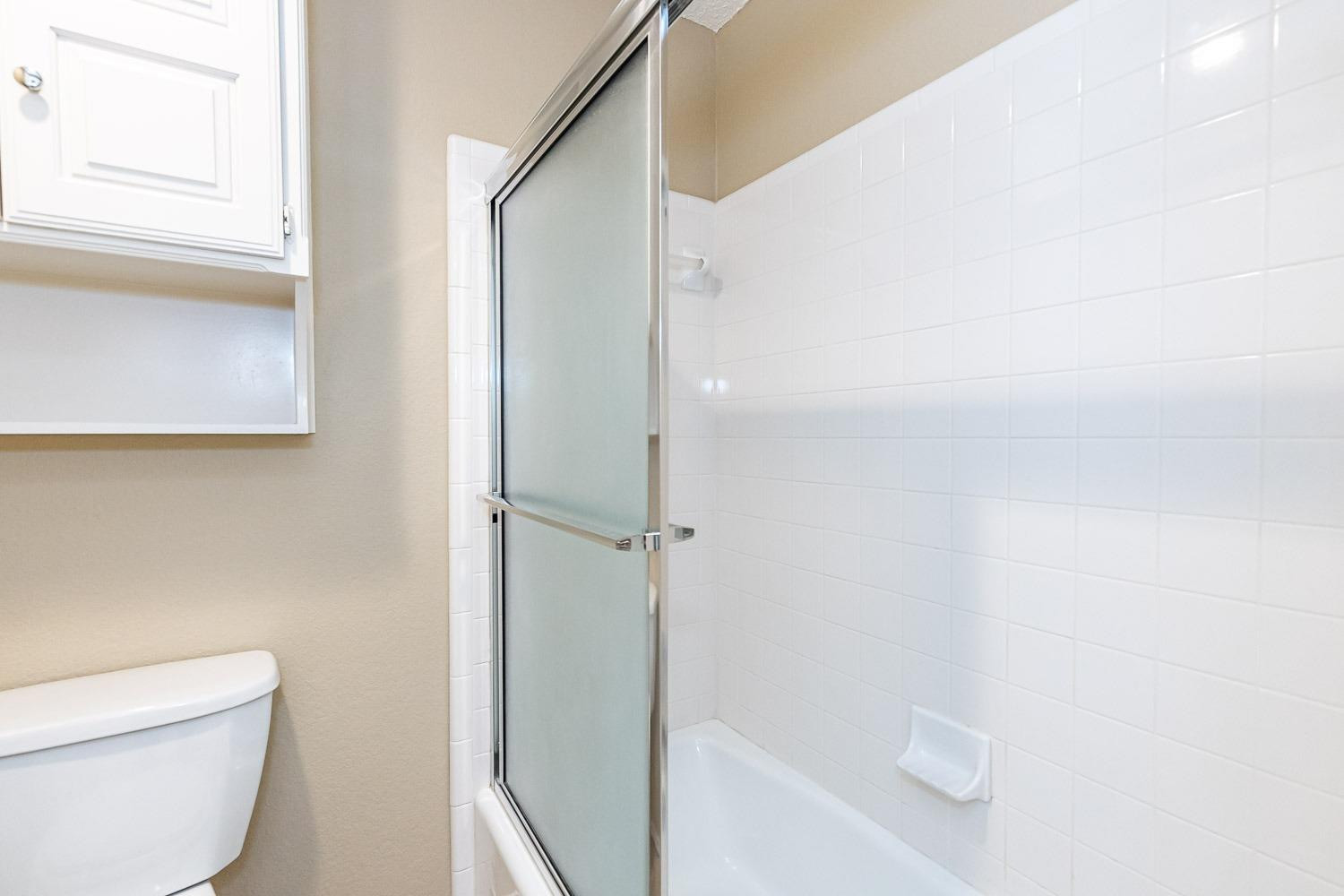 3202 66th Street, Unit A Lubbock, TX 79413 - Photo 27 of 37 Tub and Shower Combination