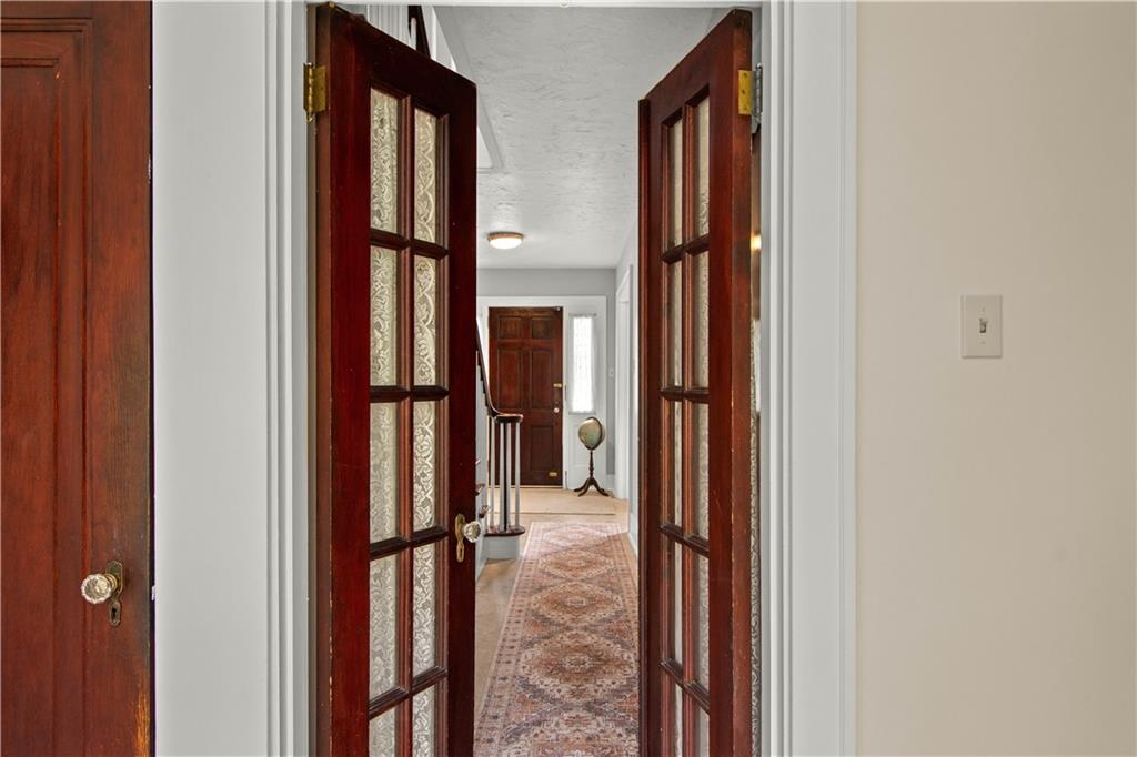 705 Walnut Street Crescent, PA 15046 - Photo 19 of 41 a view of a livingroom from a hallway