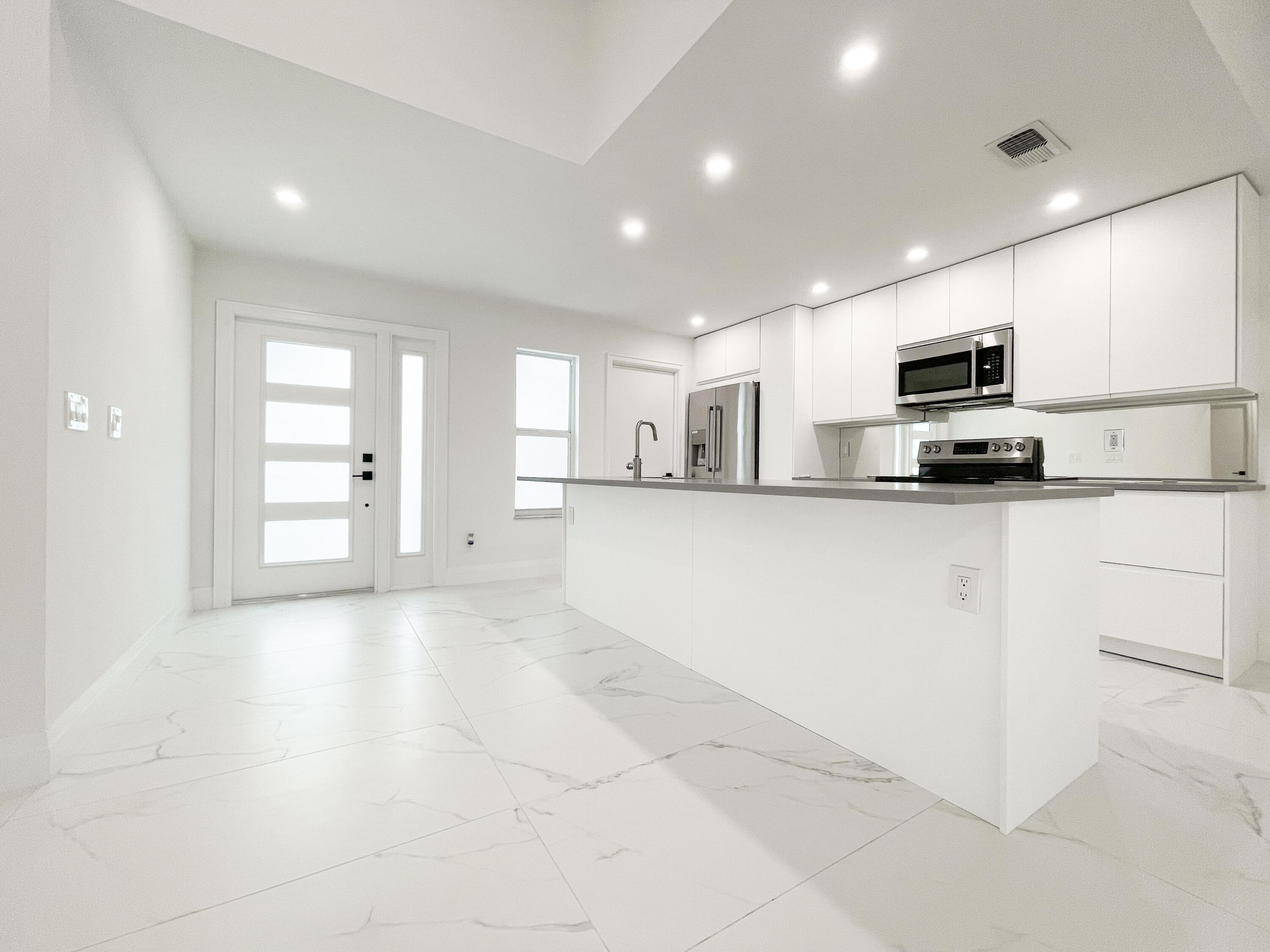 19446 Colorado Circle Boca Raton, FL 33434 - Photo 4 of 45 Kitchen + Front Door