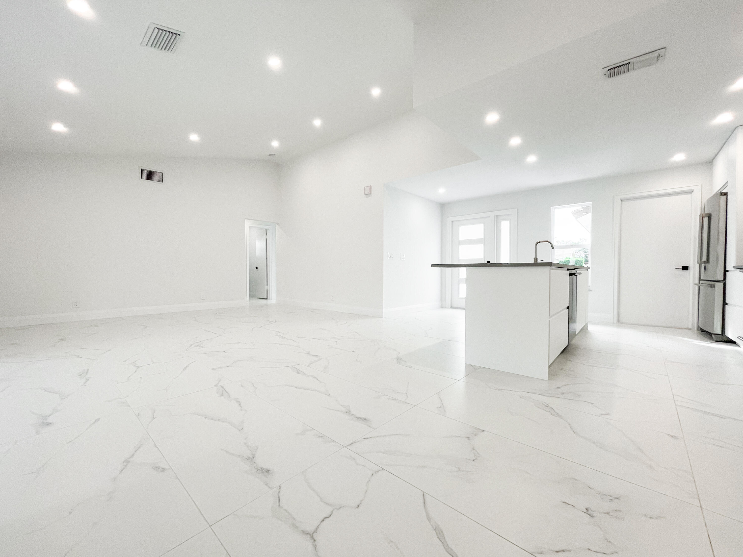 19446 Colorado Circle Boca Raton, FL 33434 - Photo 5 of 45 Kitchen + Living Room