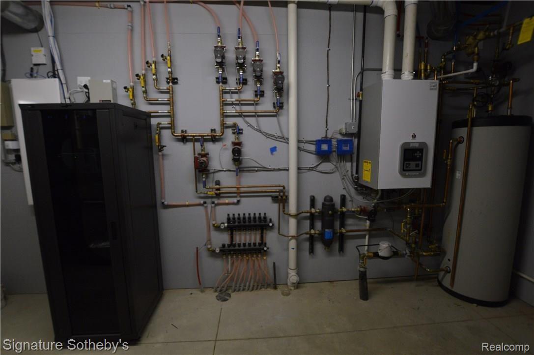1426 Eastway Rochester, MI 48306 - Photo 41 of 48 MECHANICAL ROOM W/HEATING FLOORING SYSTEM