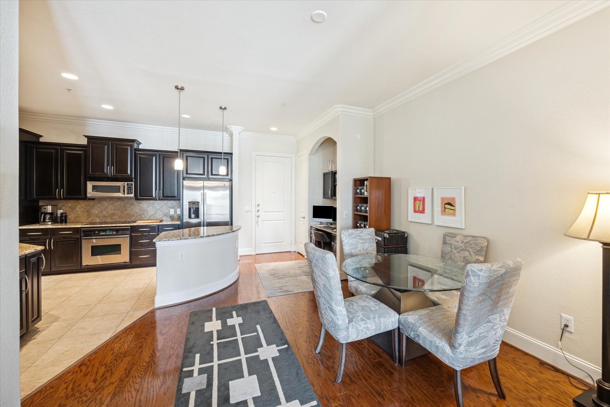 2120 Kipling Street, Unit 406 Houston, TX 77098 - Photo 10 of 19 a view of a dining room with furniture