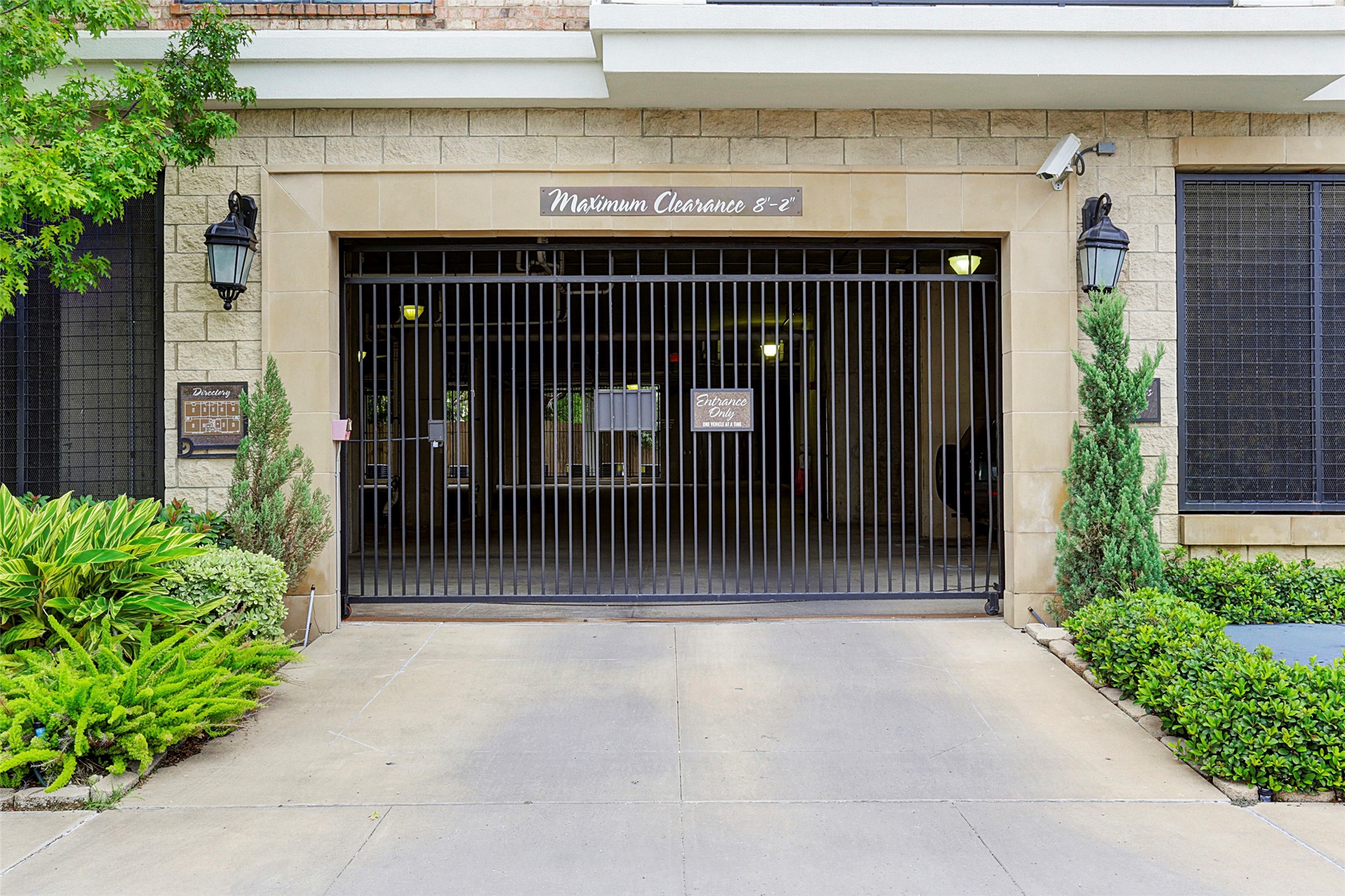 2120 Kipling Street, Unit 406 Houston, TX 77098 - Photo 18 of 19 a view of a door and a wooden door