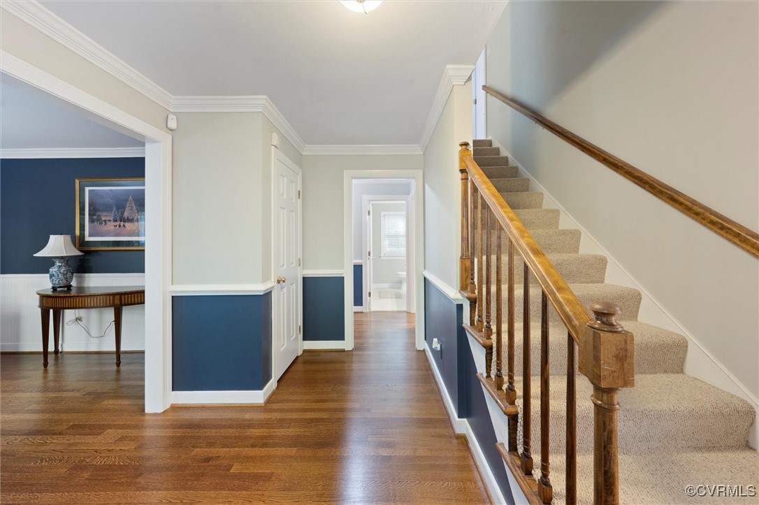 4107 Poplar Grove Road Midlothian, VA 23112 - Photo 20 of 38 a view of a hallway with wooden floor and staircase
