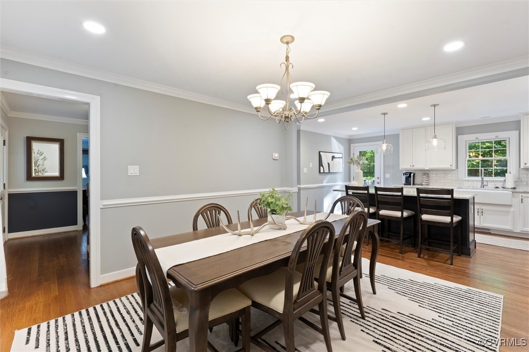 4107 Poplar Grove Road Midlothian, VA 23112 - Photo 5 of 38 a view of a dining room with furniture and wooden floor
