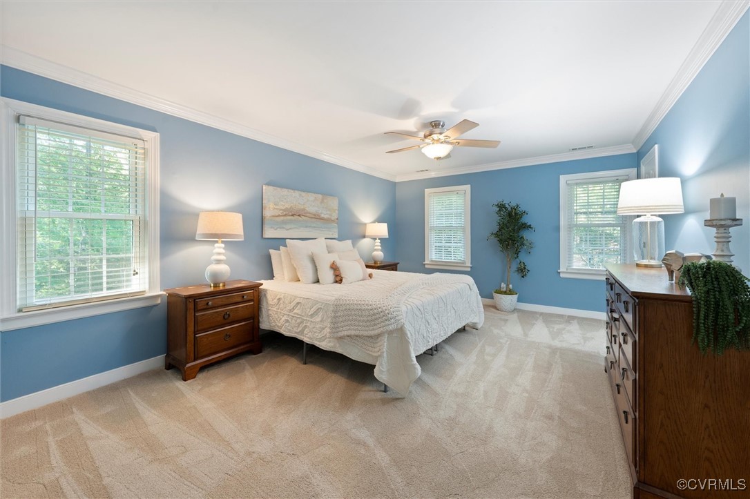 4107 Poplar Grove Road Midlothian, VA 23112 - Photo 8 of 38 a bed room with a bed and a chandelier