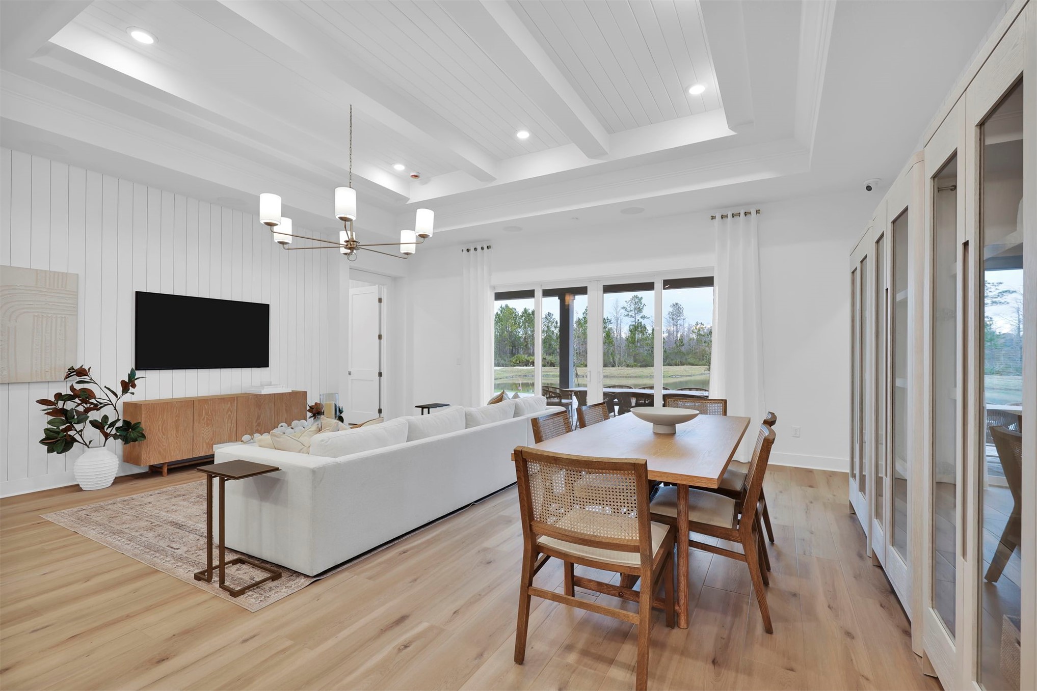 475 Pine Lilly Loop Yulee, FL 32097 - Photo 12 of 24 a living room with furniture and a flat screen tv