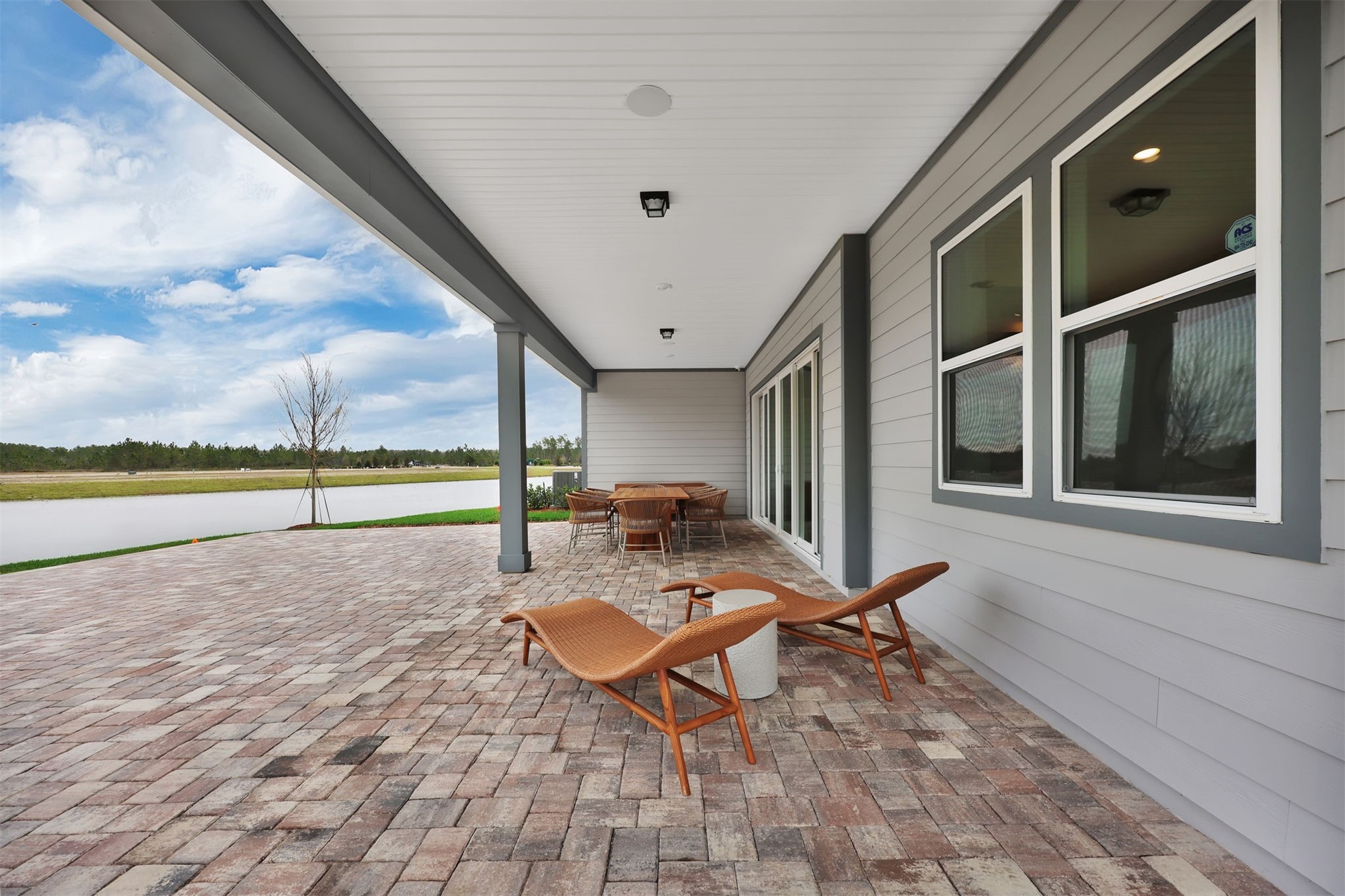 475 Pine Lilly Loop Yulee, FL 32097 - Photo 23 of 24 a view of a swimming pool and lounge chair