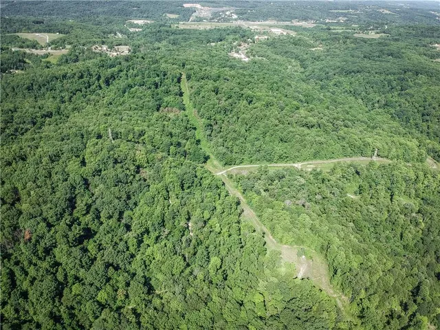 a view of fireplace with washer and dryer