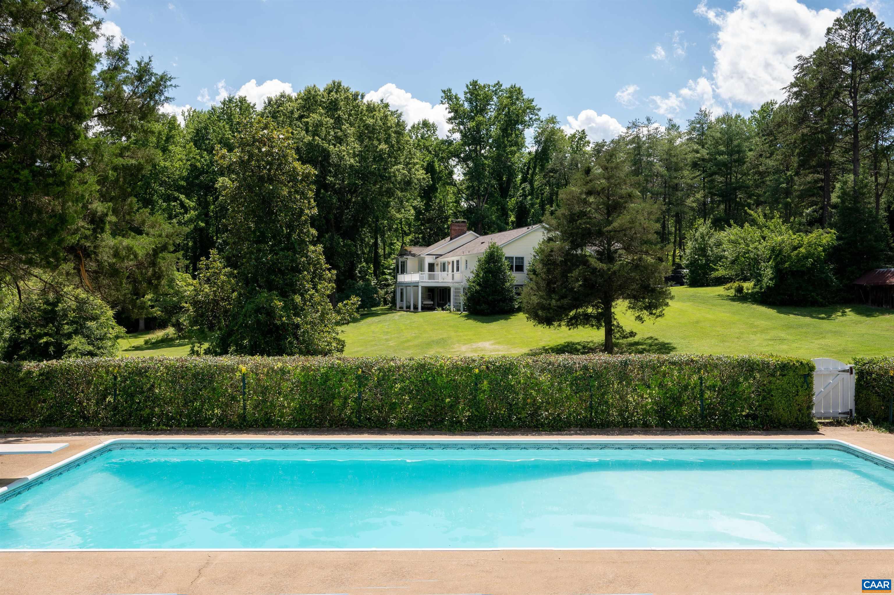 2845 Earlysville Road Earlysville, VA 22936 - Photo 2 of 35 a view of a swimming pool with a yard