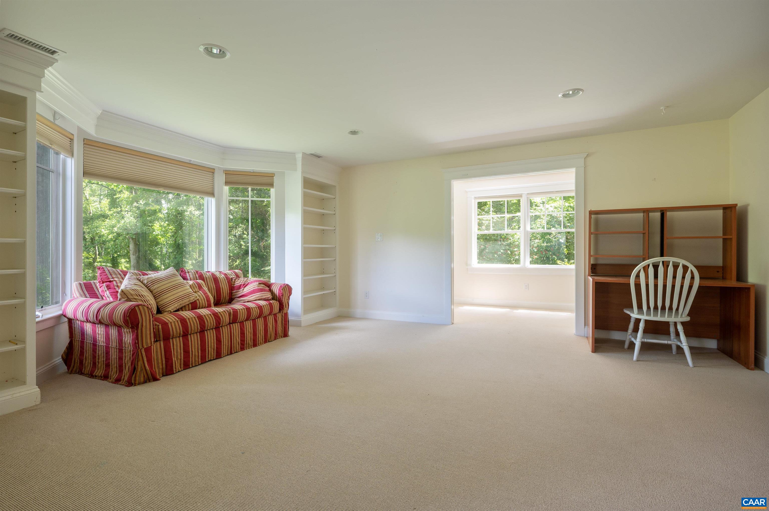 2845 Earlysville Road Earlysville, VA 22936 - Photo 21 of 35 a balcony with furniture and a window
